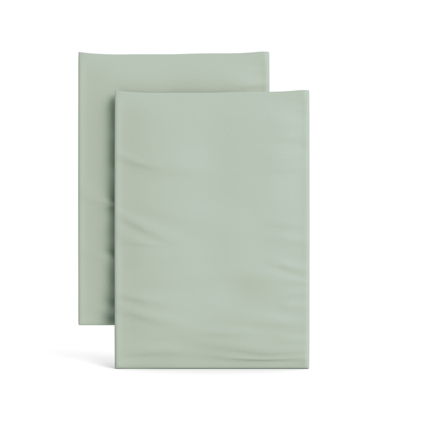 Two folded sage green Ann Gish Ready-to-Bed 2.0 pillowcases stacked on white background.