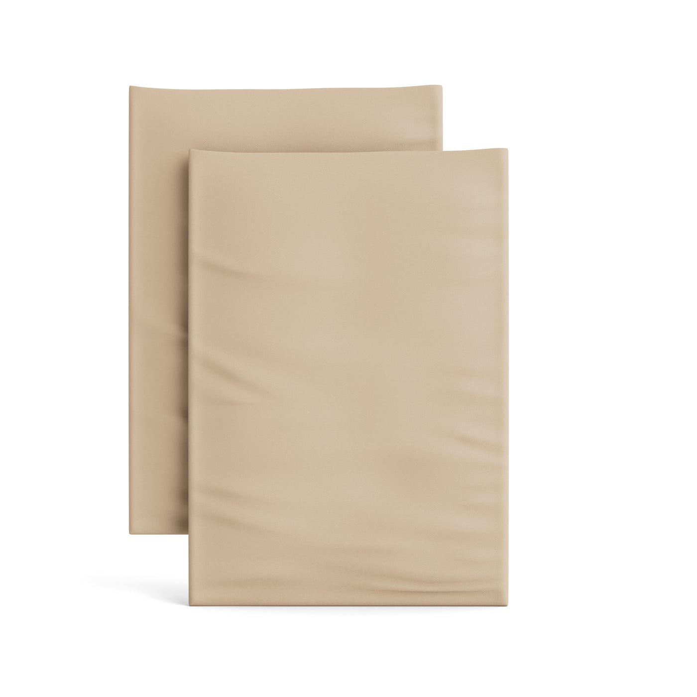 Two folded Ann Gish Ready-to-Bed 2.0 pillowcases in warm sand, smooth satin finish.
