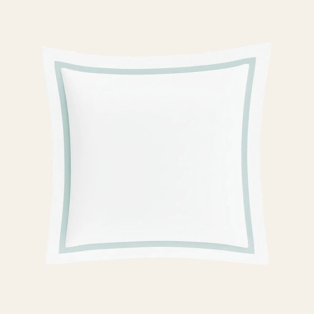 Ann Gish Ready-to-Bed 2.0 cotton sham in white with seafoam trim border.