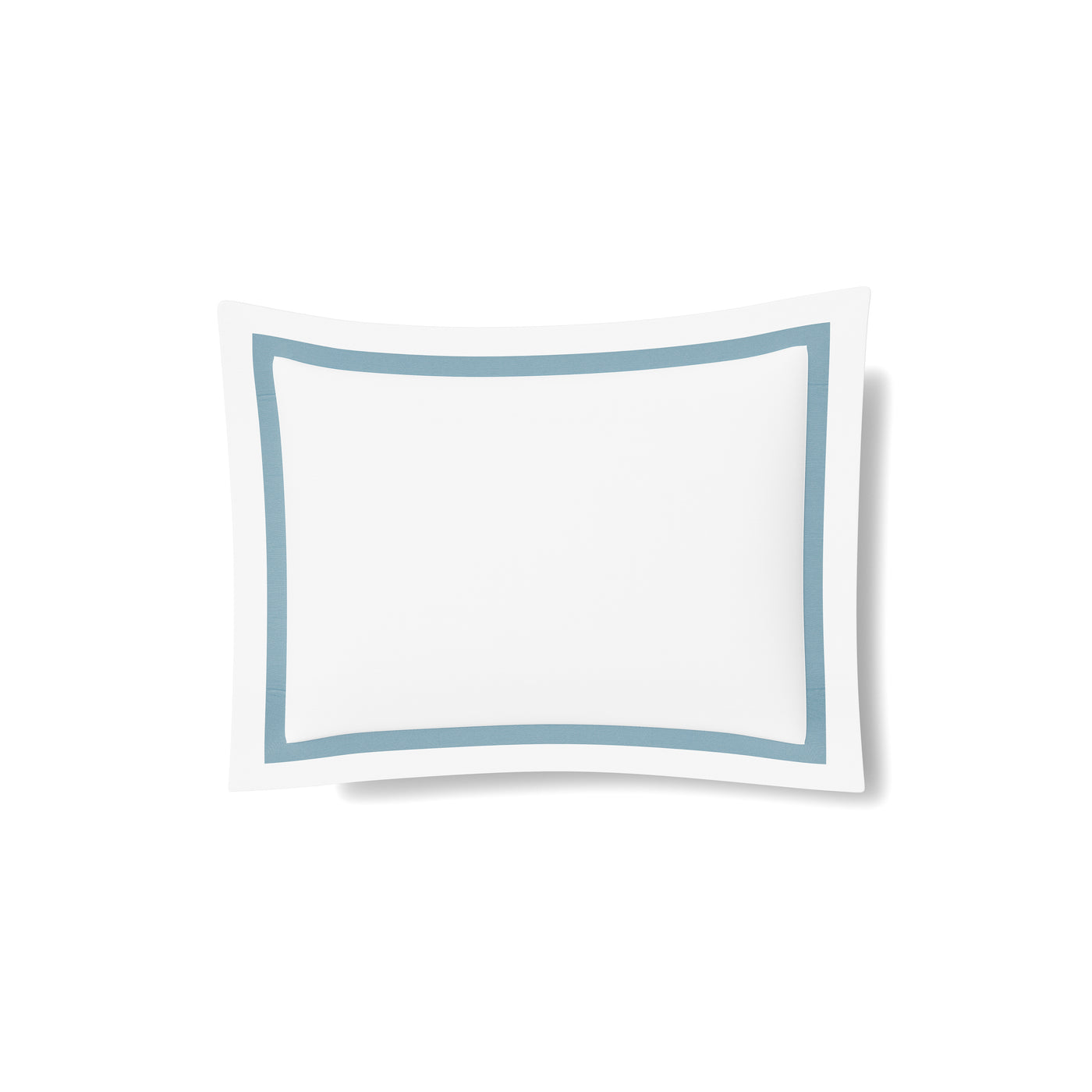 White cotton sham with sky blue trim border detail, isolated on white background.
