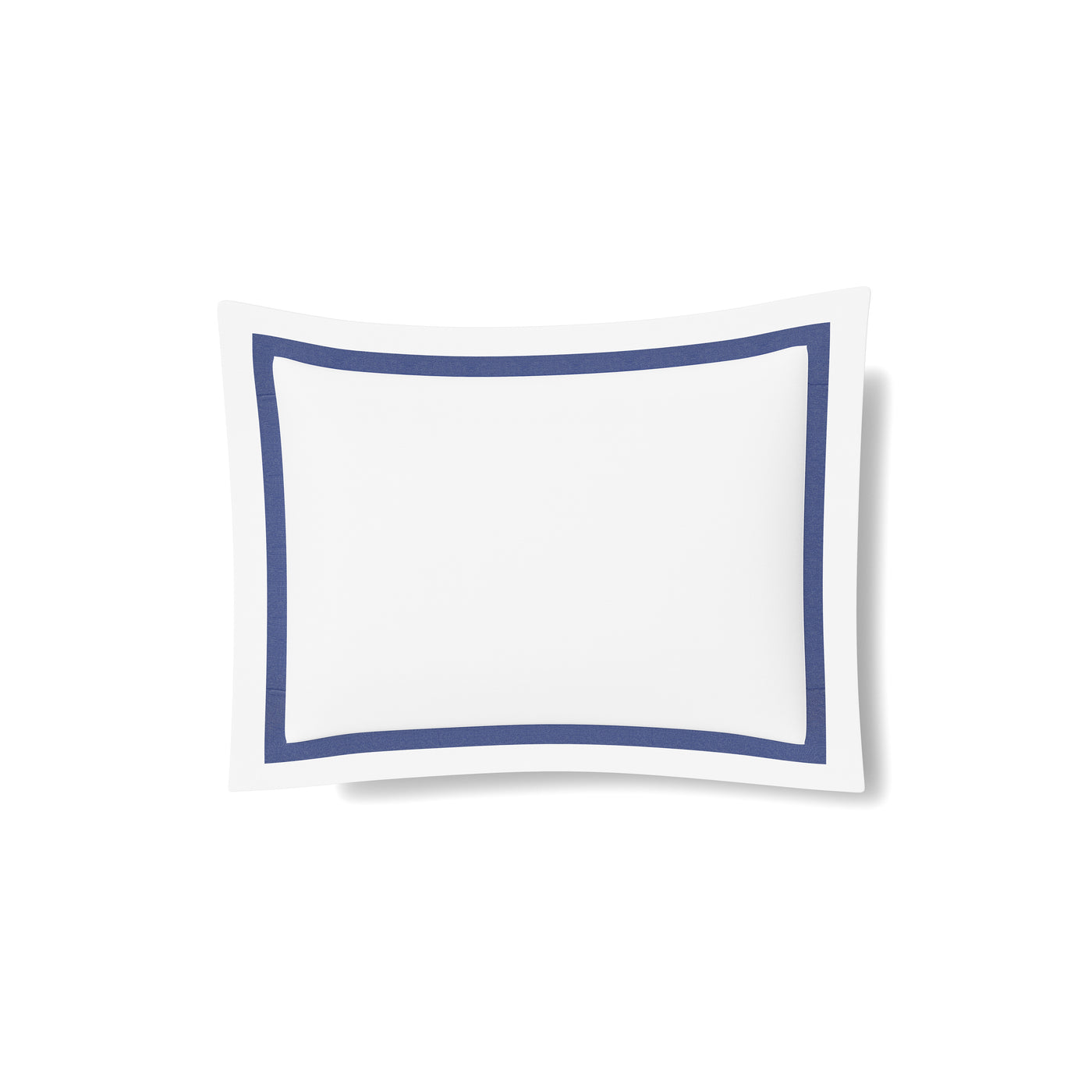 White cotton sham with navy trim border detail, isolated on white background.