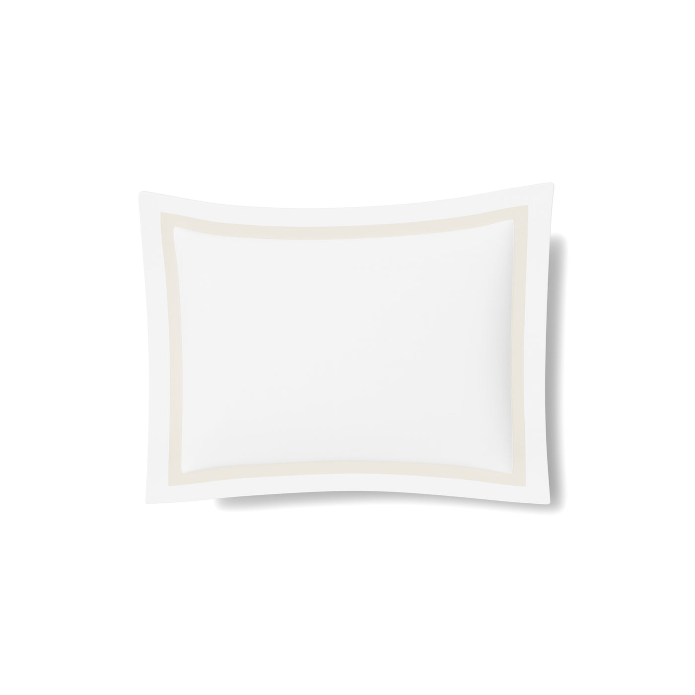 White cotton sham with champagne trim border detail, flat lay on white background.