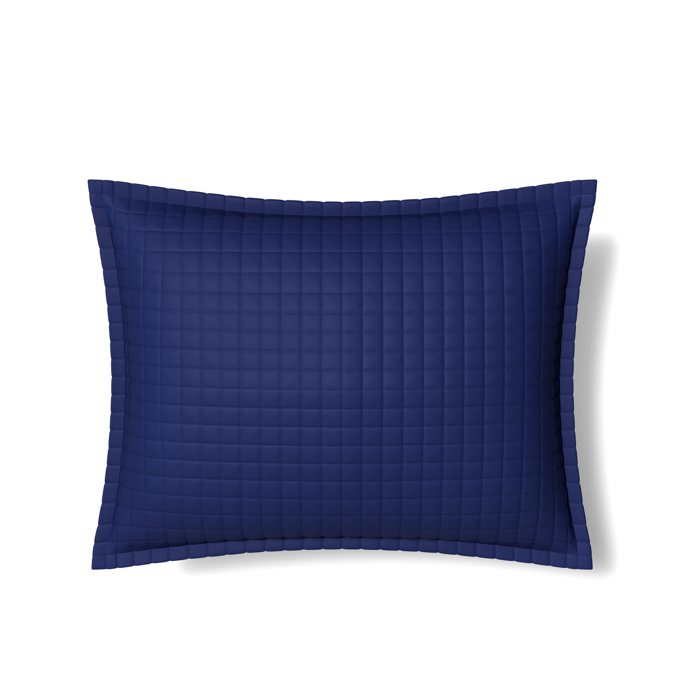 Navy blue Ann Gish quilted sham with grid stitching and flanged border, flat lay.