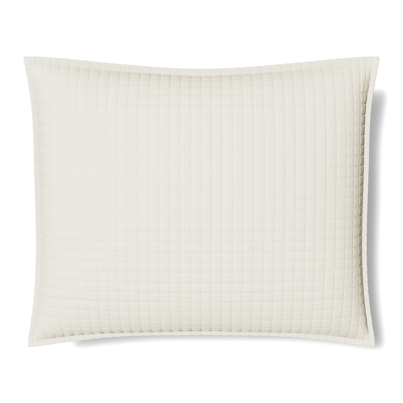 Close-up of Ann Gish ivory quilted pillow with grid stitching and flanged edge.
