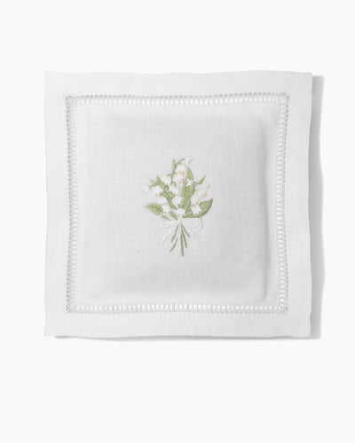 Henry Handwork Lily of the Valley sachet in white linen with hemstitch border and floral embroidery.