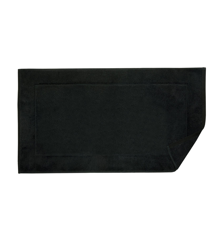 Sferra Sarma onyx terry cotton tub mat with border detail, flat lay.