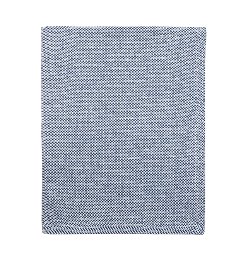 Sferra Terzo bed end in cobalt blue woven cotton, flat lay on white background.