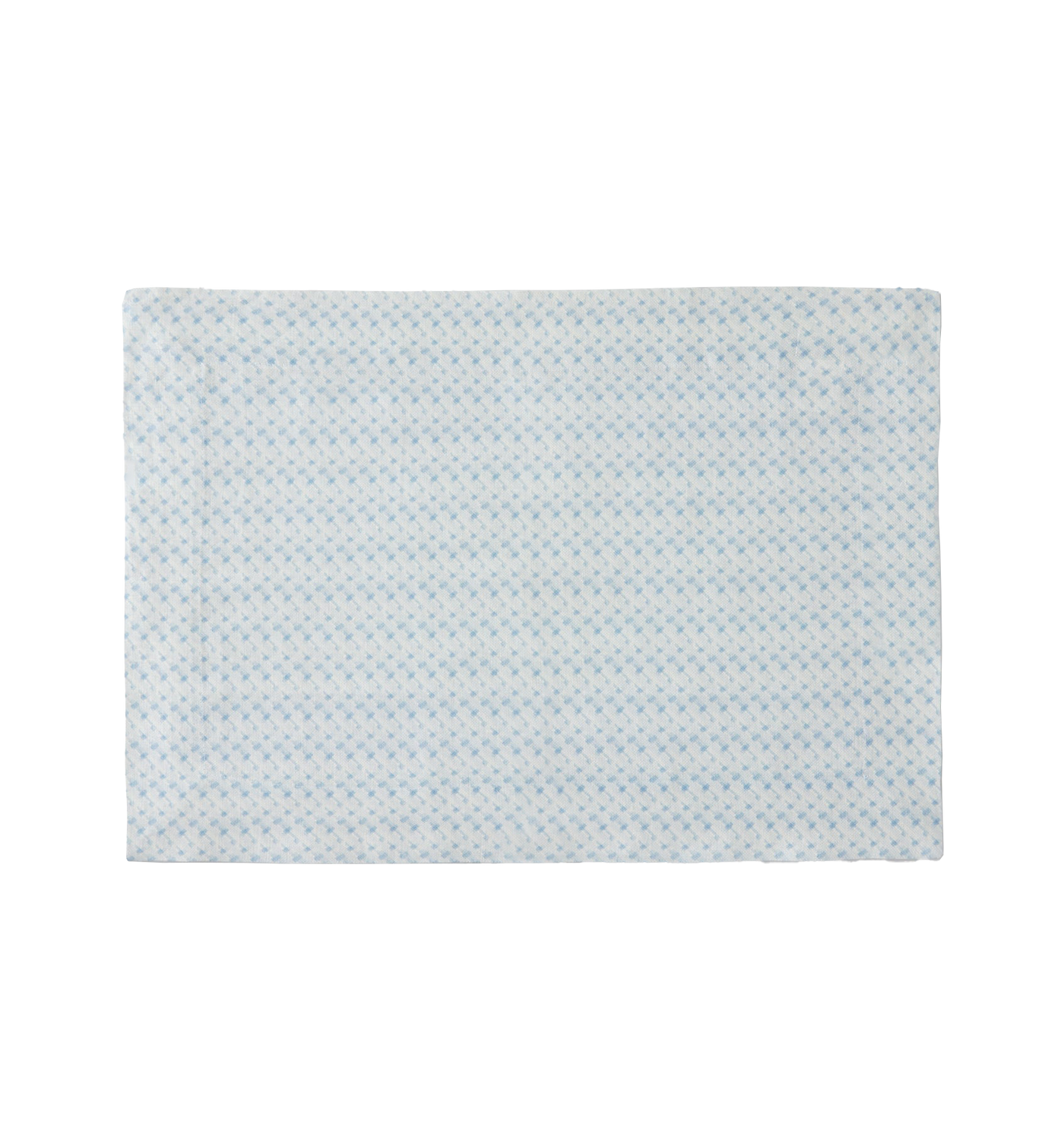 Sferra Abruzzo placemat in ivory with a sky blue geometric dot pattern.