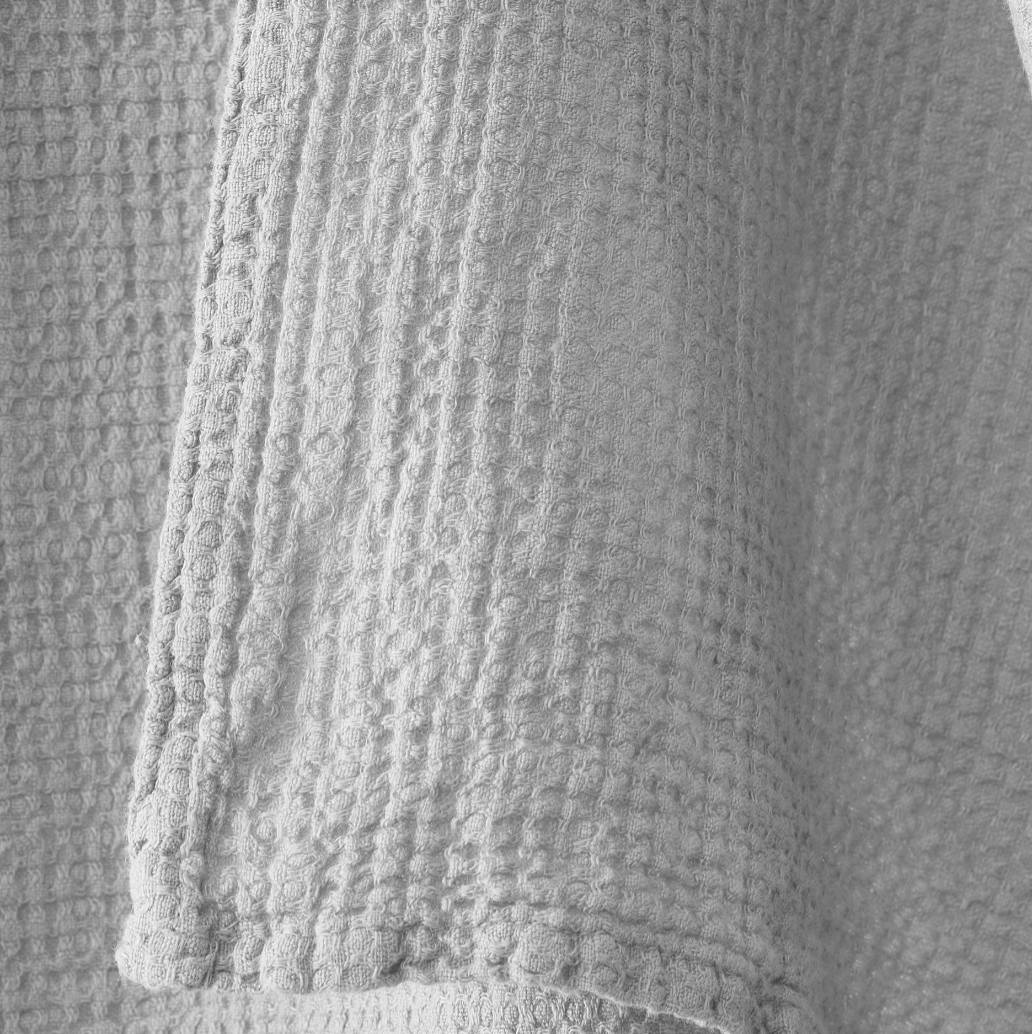 Close-up of Society Limonta Lipe New robe sleeve hem in silver-grey waffle cotton weave.
