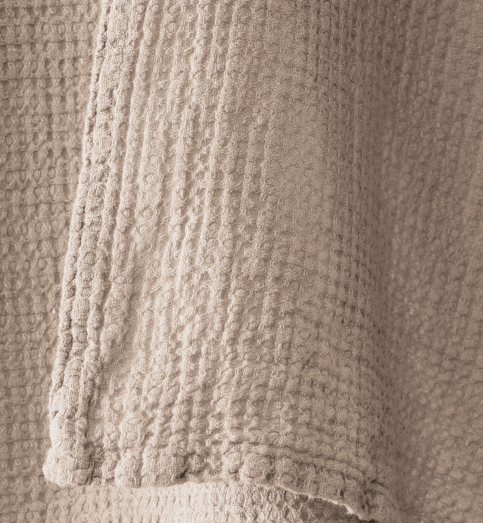 Close-up of Society Limonta Lipe New robe sleeve in sand, showing waffle-weave texture.
