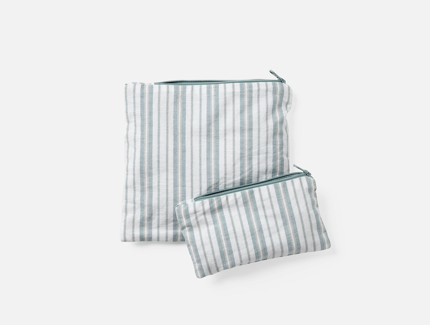 Coyuchi Conserve snack bag set in sage stripe, large and small pouches with zipper closure.
