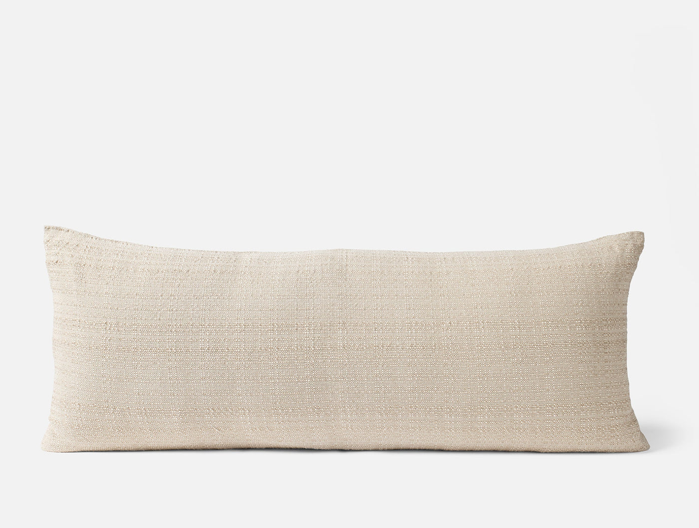 Coyuchi Lido lumbar pillow in ivory, showcasing woven texture against a white background.