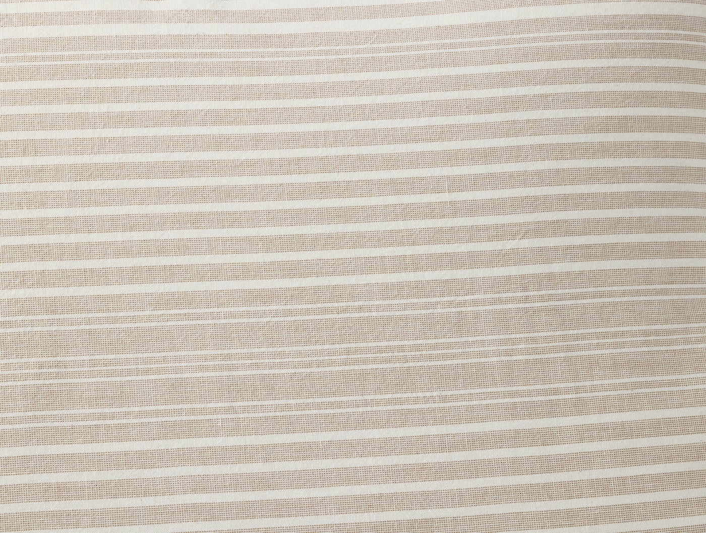 Close-up of Coyuchi Little Sur Stripe duvet cover in sand and ivory woven stripe pattern.