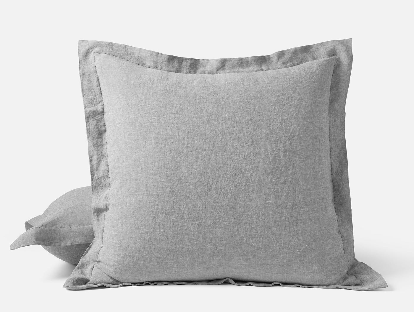 Coyuchi Relaxed Linen sham in silver-gray, flanged edge detail, square Euro size.