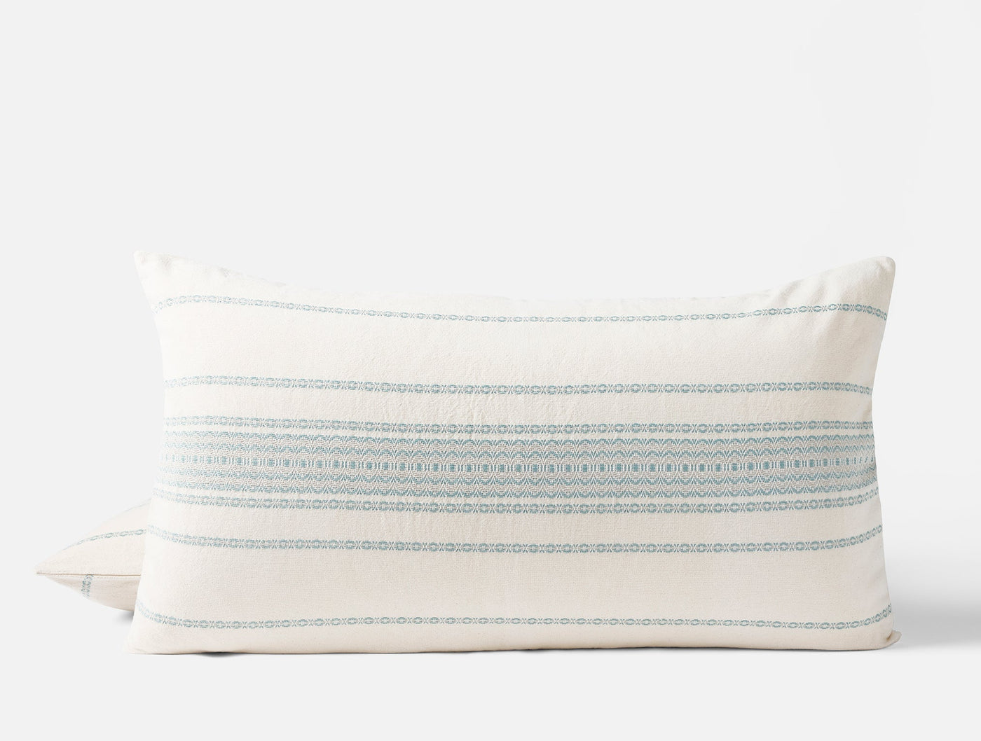 Coyuchi Rippled Stripe sham in ivory with blue woven stripe detail, lumbar view.