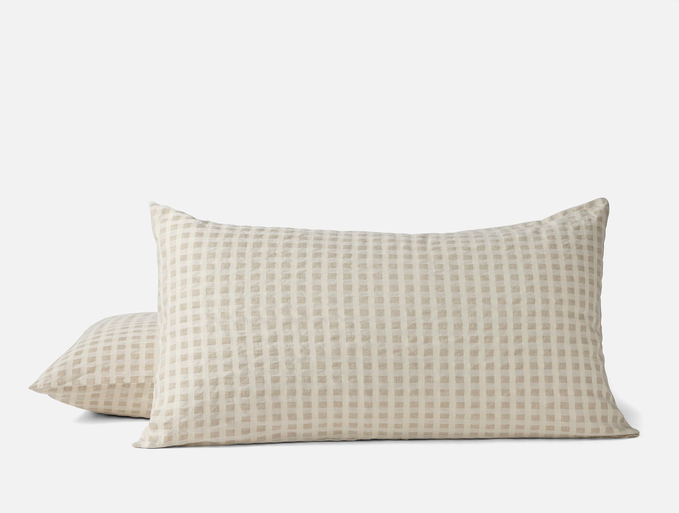 Coyuchi Birch pillow shams in natural with woven grid texture, king size pair.