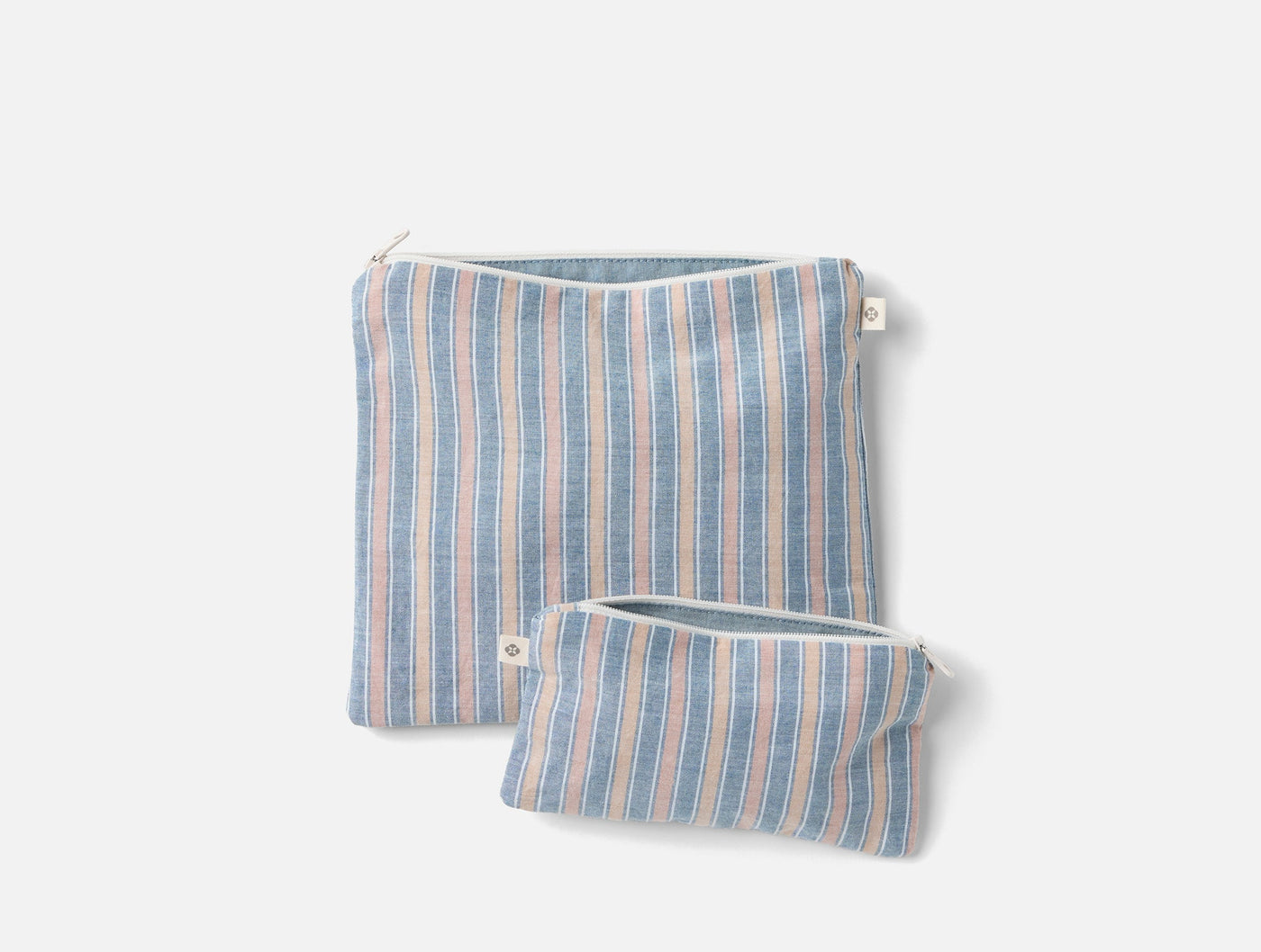 Coyuchi striped linen snack bag set, large and small, blue and blush tones.