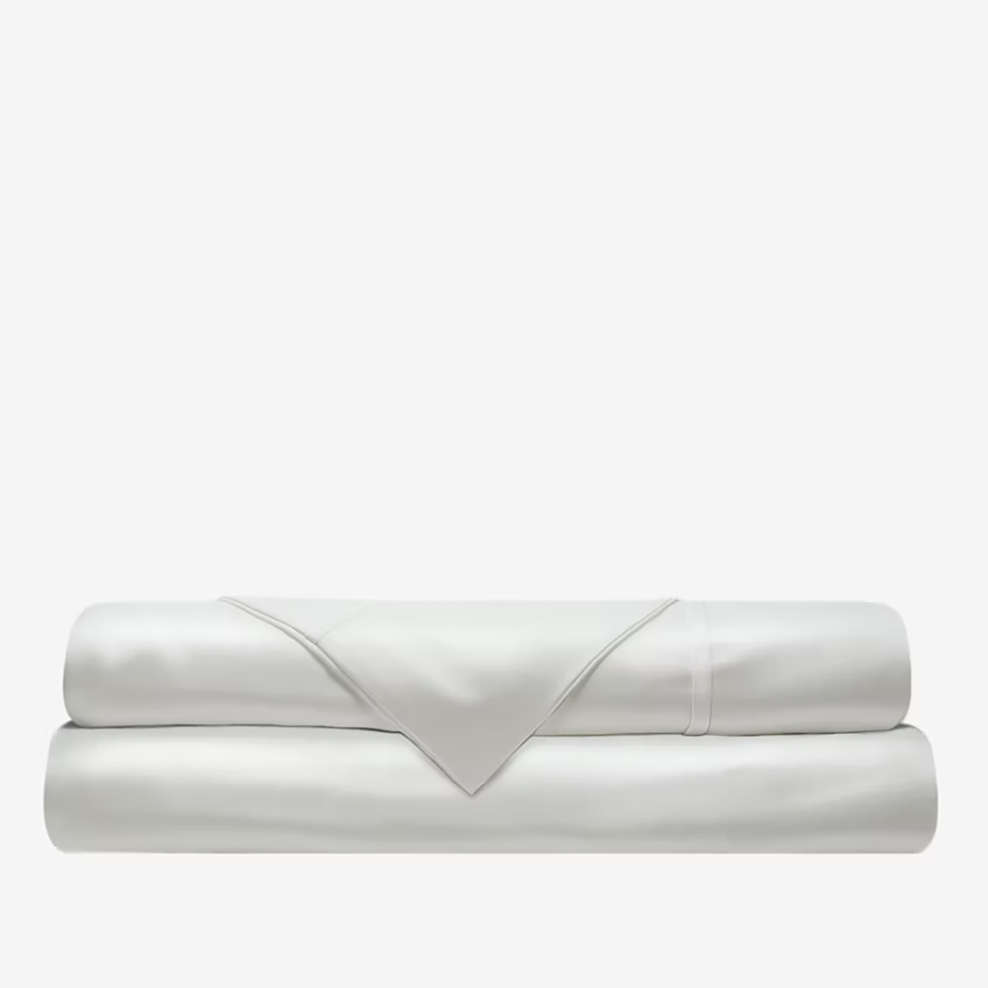 Folded ivory sateen fitted sheet stacked with flat sheet, smooth lustrous finish visible.