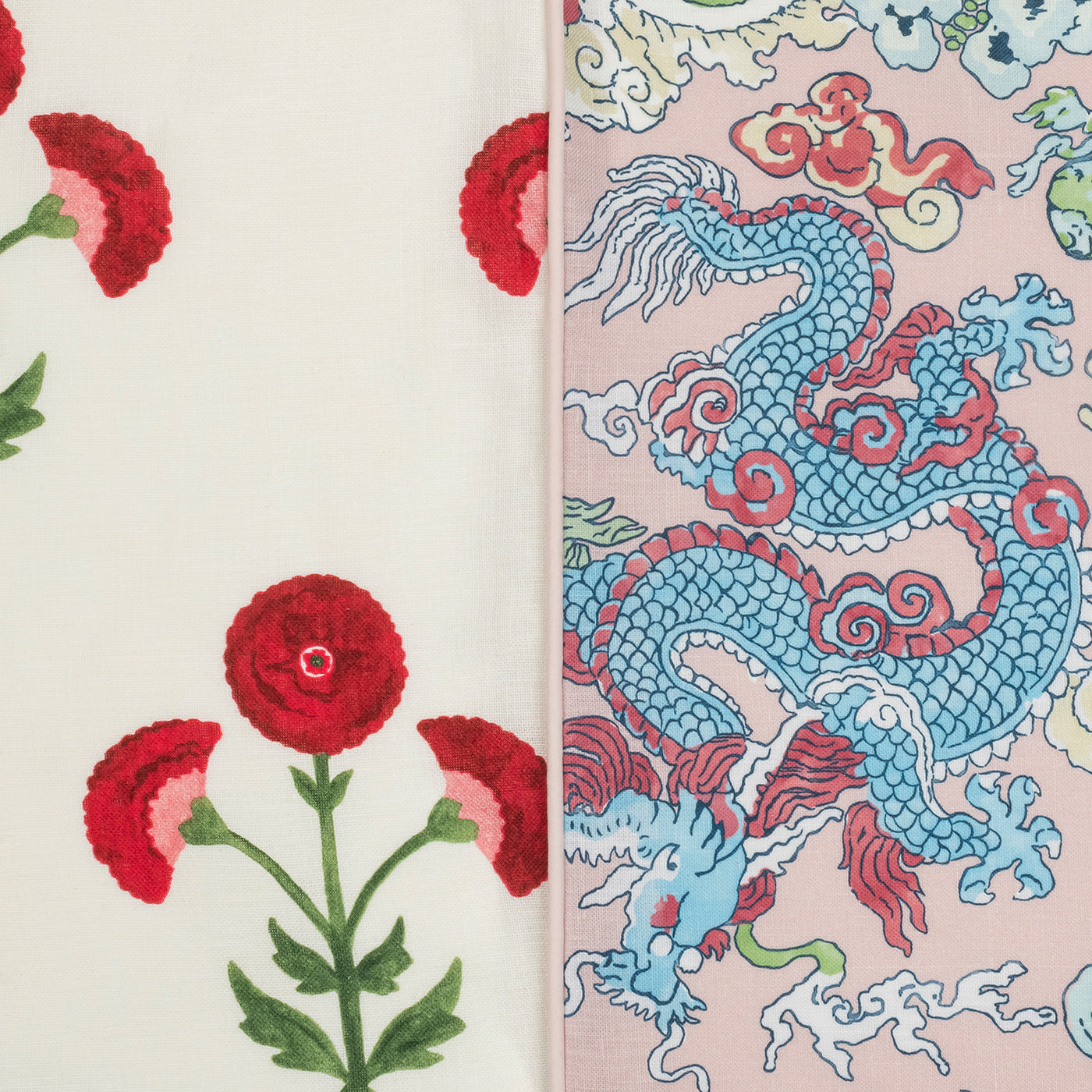 The Matouk Reversible Quilted Lumbar Pillow Cover features two patterns: red flowers on off-white and a blue dragon with clouds on pink—ideal for customizing or adding a bold touch to your decor.