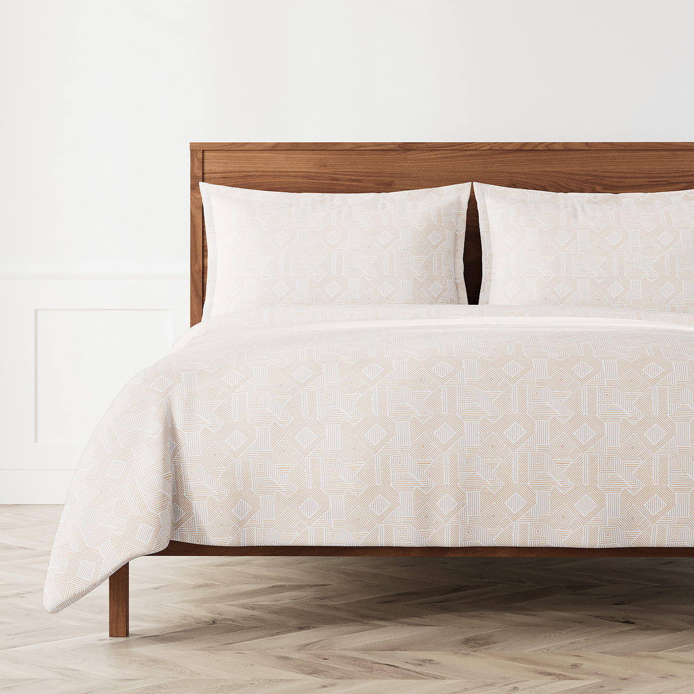 Ann Gish Sashiko duvet set in ivory, geometric pattern, styled on wood-frame bed.