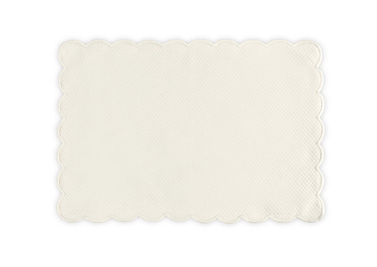 The Savannah Gardens Placemat Set by Matouk features a rectangular, cream-colored placemat with a diamond pique texture and scalloped edge, displayed on a white background.