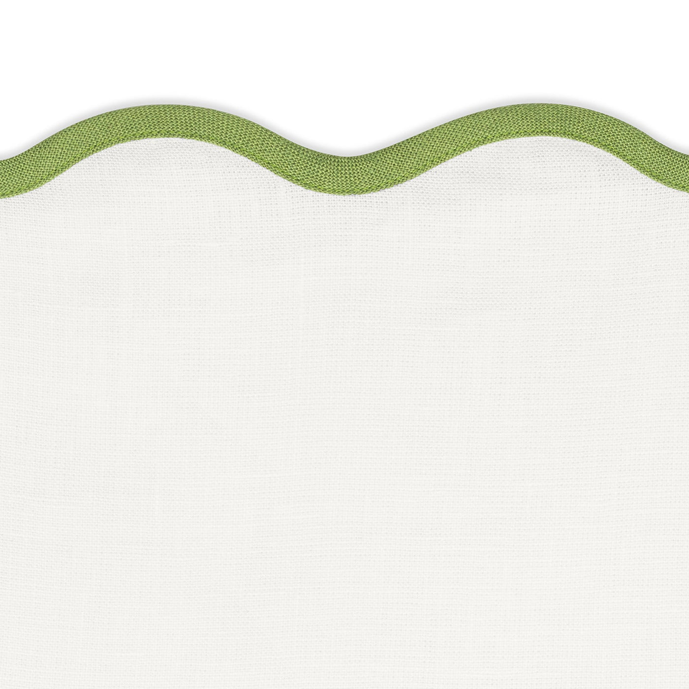 Matouk's Scallop Edge | Napkin Set features white fabric with a green scalloped trim—perfect for a unique tablescape, whether used as napkins or layered with your favorite placemats.