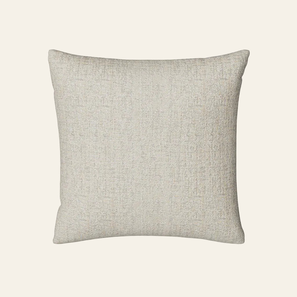 Ann Gish Serac pillow in ivory with textured woven fabric, square silhouette.