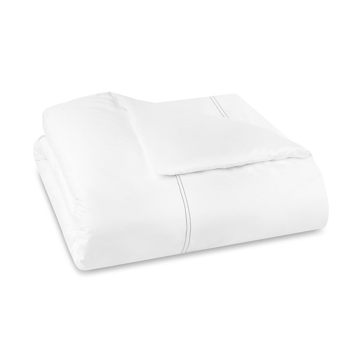 Folded white comforter with subtle gray stripes on a white background—perfect to pair with the Sferra Sereno Duvet Cover for an elegant, cozy bedroom look.