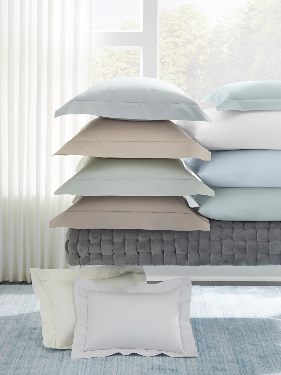 Image of Sferra Celeste bedding pillow stack.