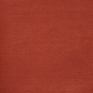 Close-up of Sferra Festival linen fabric in terracotta showing woven texture.