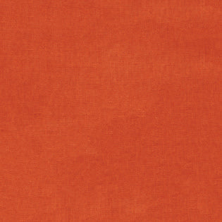 Close-up of tangerine linen weave texture on Sferra Festival cocktail napkin.