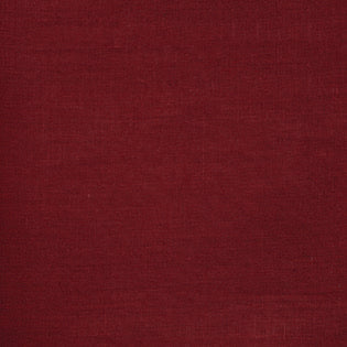 Close-up of crimson linen weave texture on Sferra Festival cocktail napkin.