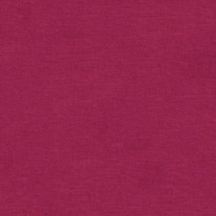 Close-up of raspberry linen weave texture on Sferra Festival cocktail napkin.