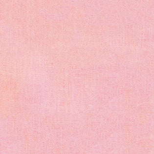 Blush pink linen cocktail napkin close-up showing fine plain weave texture.