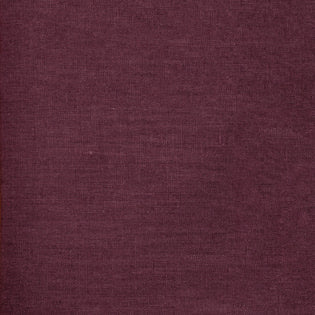 Close-up of Sferra Festival table runner in deep plum linen weave texture.