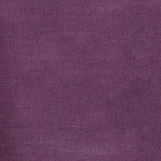 Close-up of Sferra Festival table runner in plum linen weave texture.