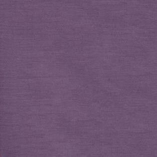 Close-up of amethyst linen-blend fabric texture on Sferra Festival table runner.
