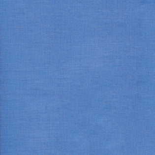 Close-up of Sferra Festival tablecloth fabric in periwinkle blue linen weave texture.