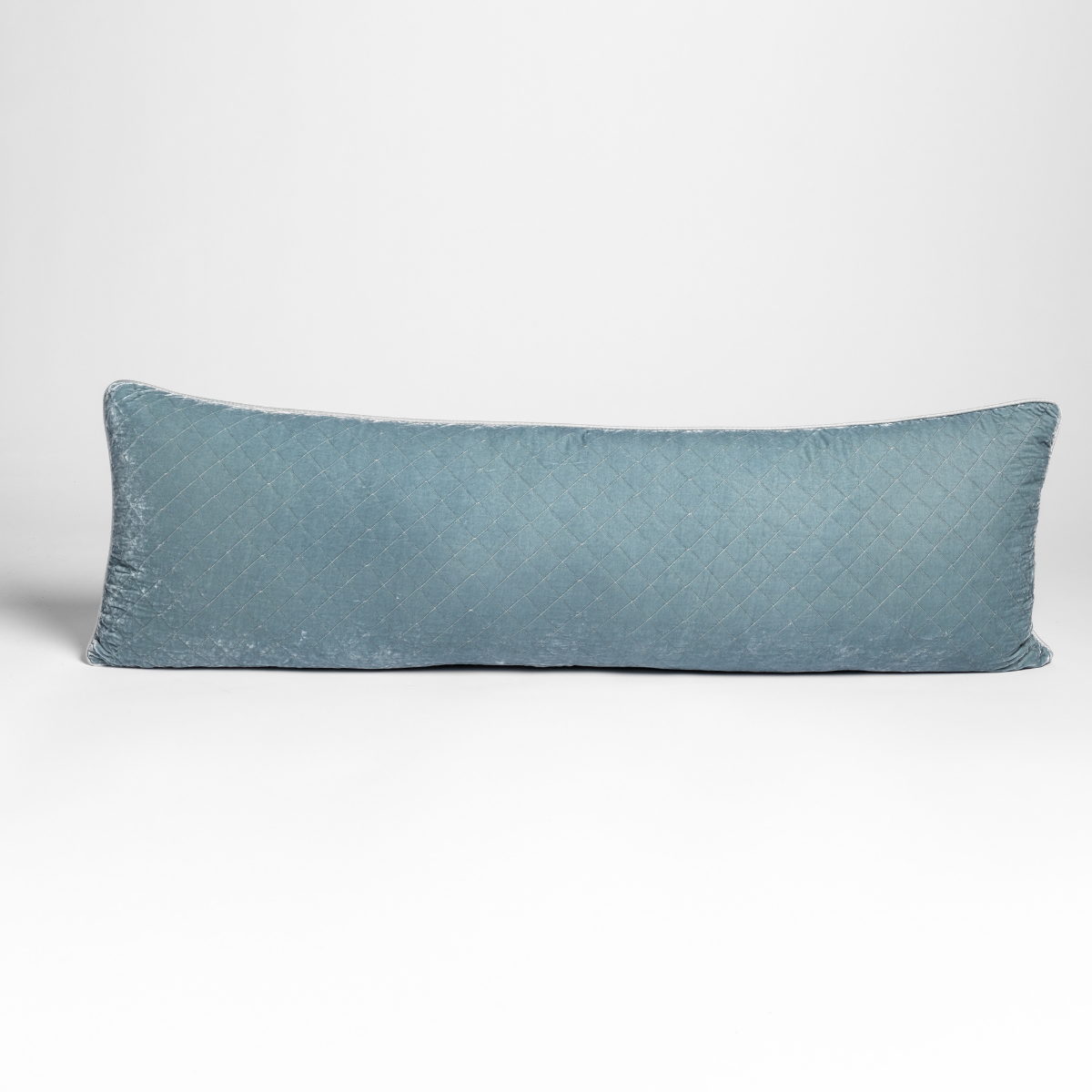 Bella Notte Cloud silk velvet quilted lumbar pillow, elongated rectangular shape against white background.