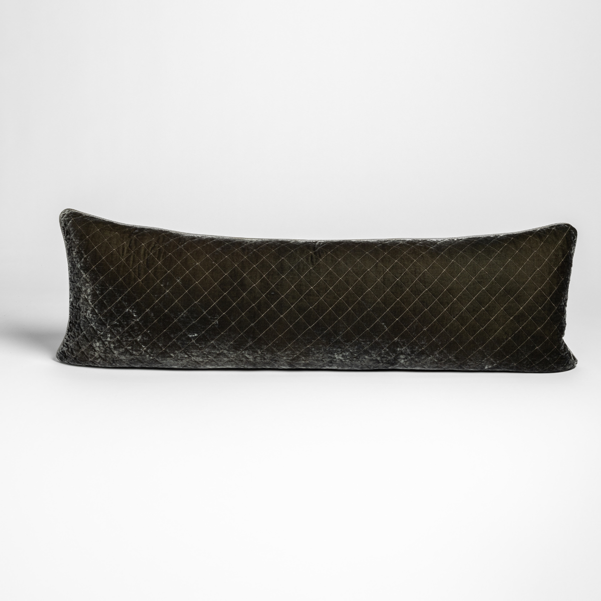 Bella Notte Silk Velvet quilted lumbar pillow in Fog, diamond-stitched velvet, side angle view.