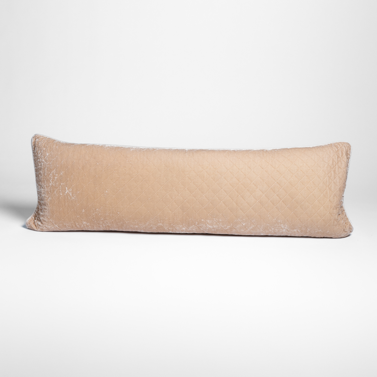 Bella Notte Pearl silk velvet quilted throw pillow, long lumbar silhouette against neutral background.
