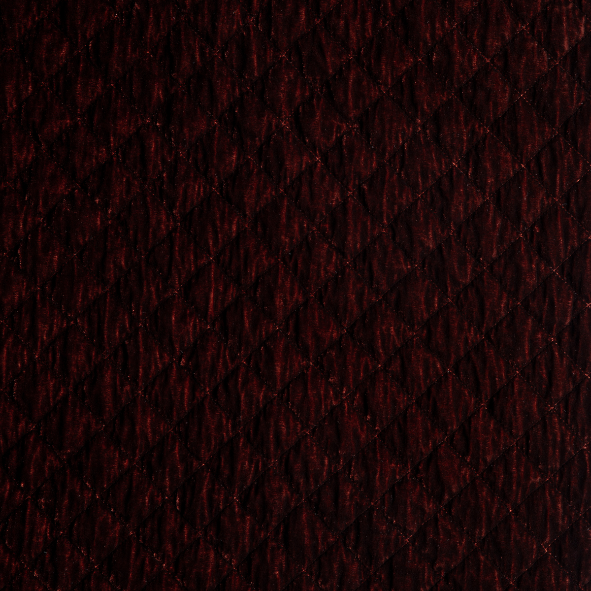Close-up of Bella Notte Silk Velvet Quilted Sham in Autumn, showing diamond quilt pattern.