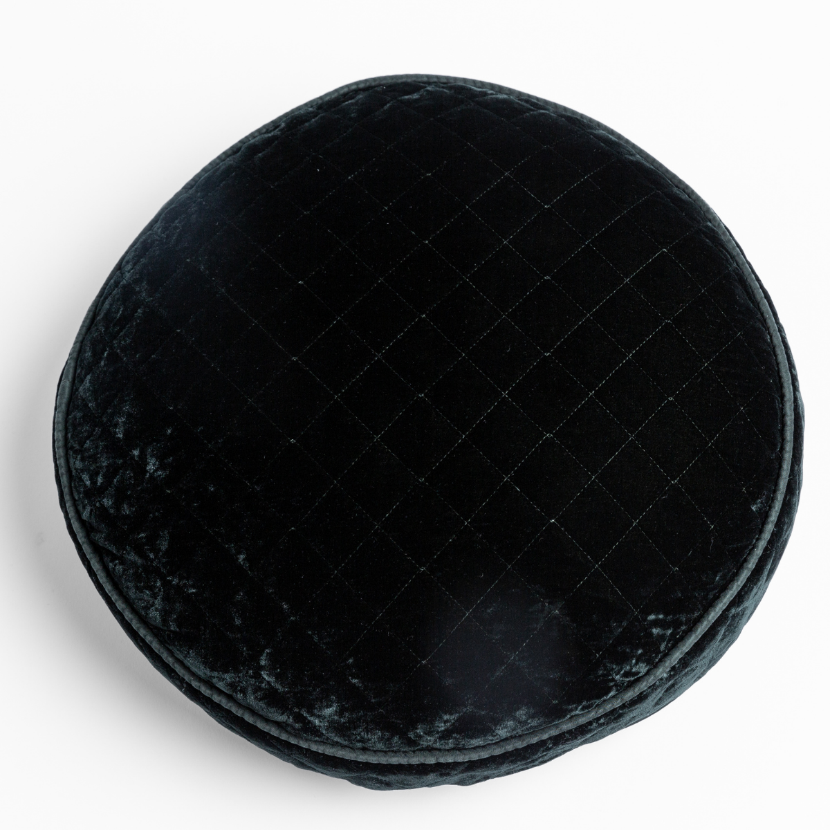 Overhead view of Bella Notte Silk Velvet Quilted Throw Pillow in Juniper, round shape.