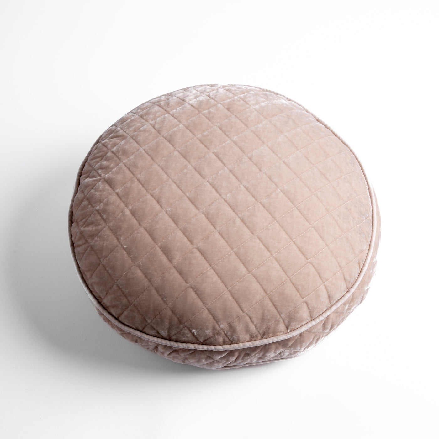 Bella Notte Pearl silk velvet round quilted throw pillow with diamond stitching and piped edge.