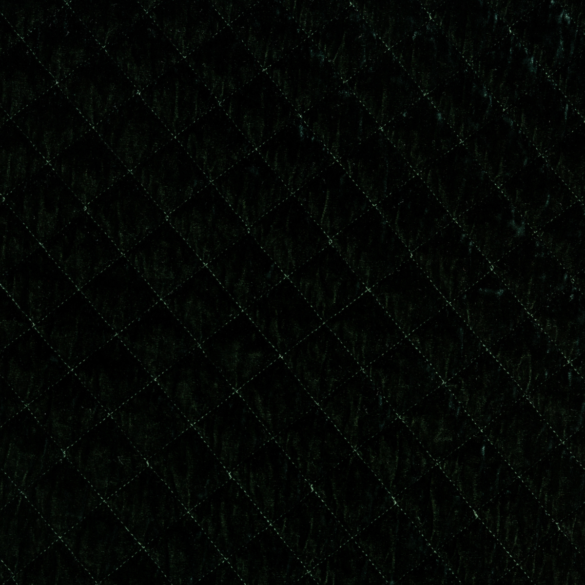 Close-up of Juniper silk velvet quilted coverlet showing diamond stitching detail.