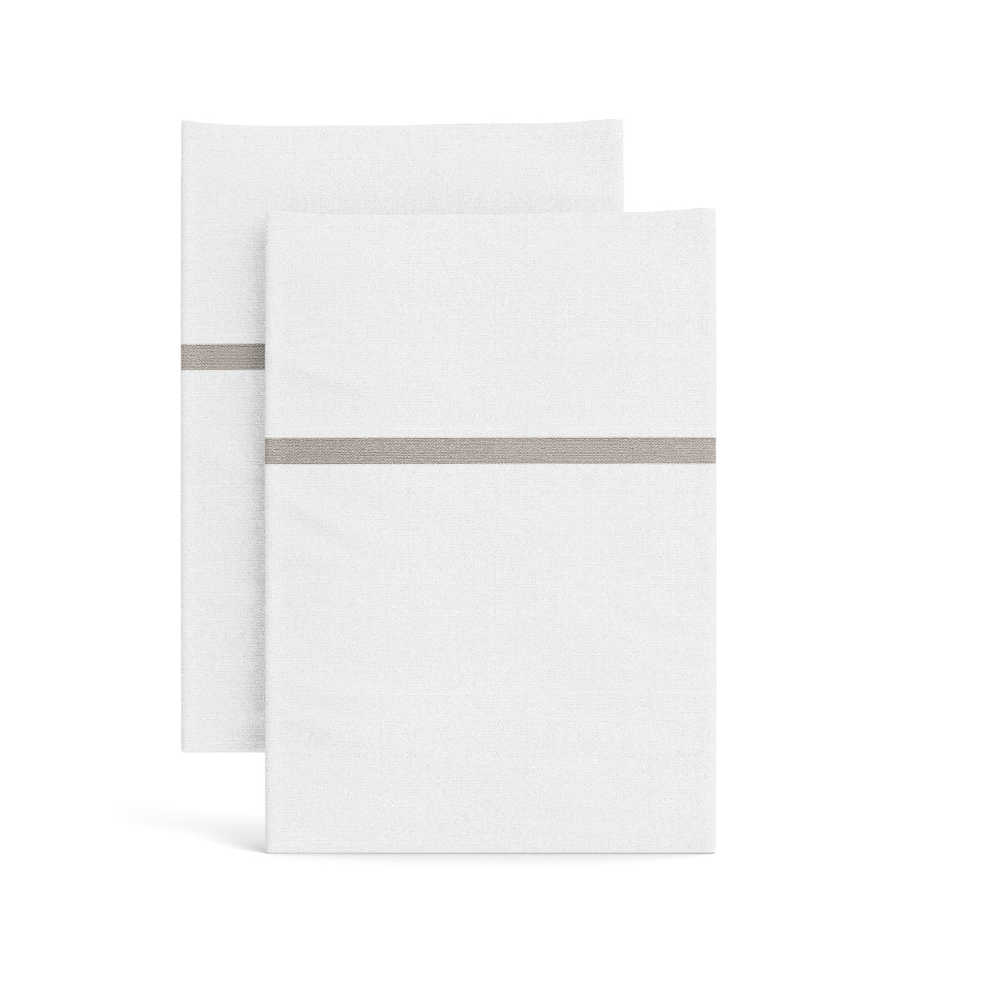 Close-up of two white Ann Gish Silk Trim pillowcases with taupe horizontal stripe detail.