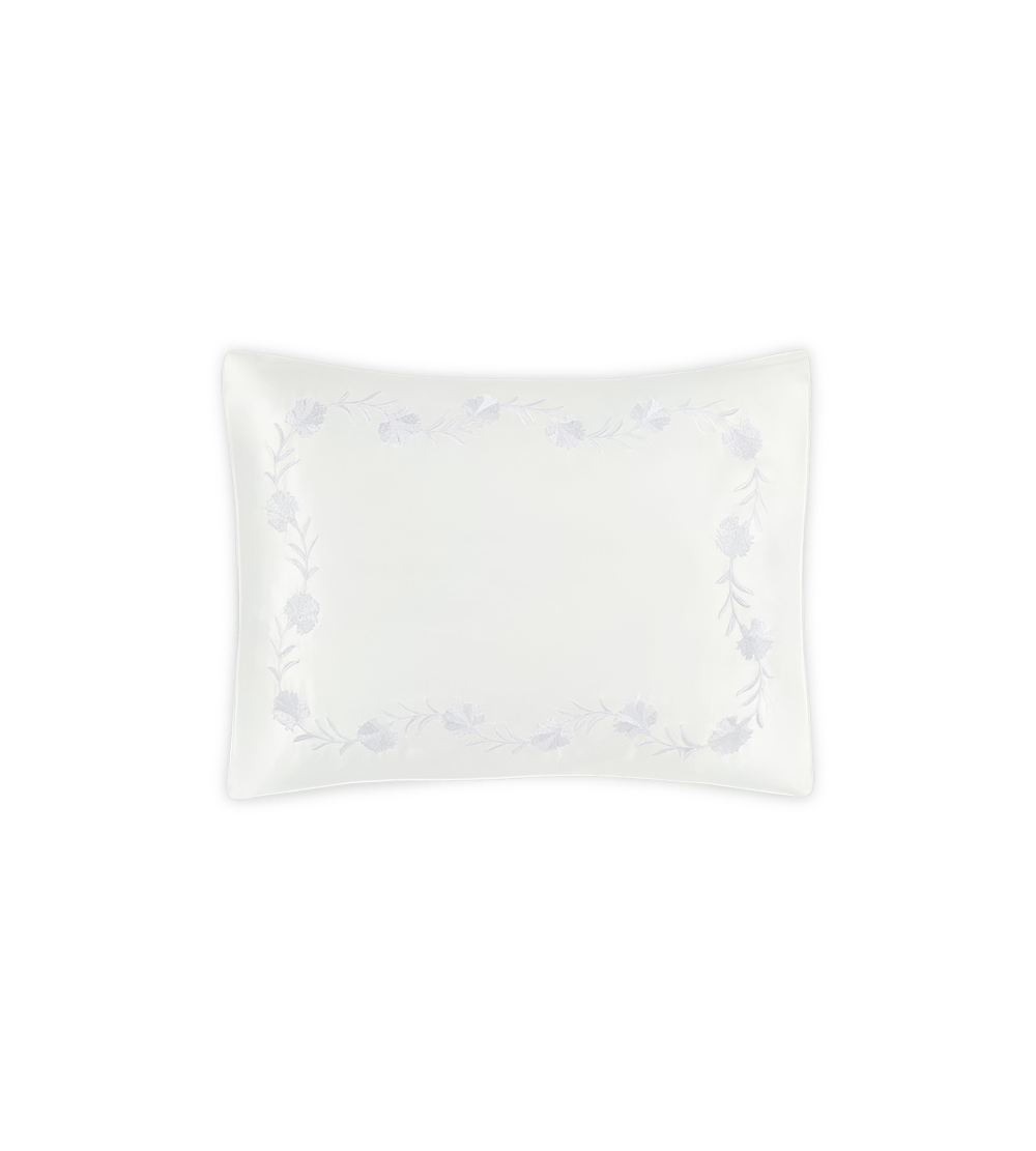 Matouk Daphne ivory silk pillowcase with delicate lavender floral embroidered border.
