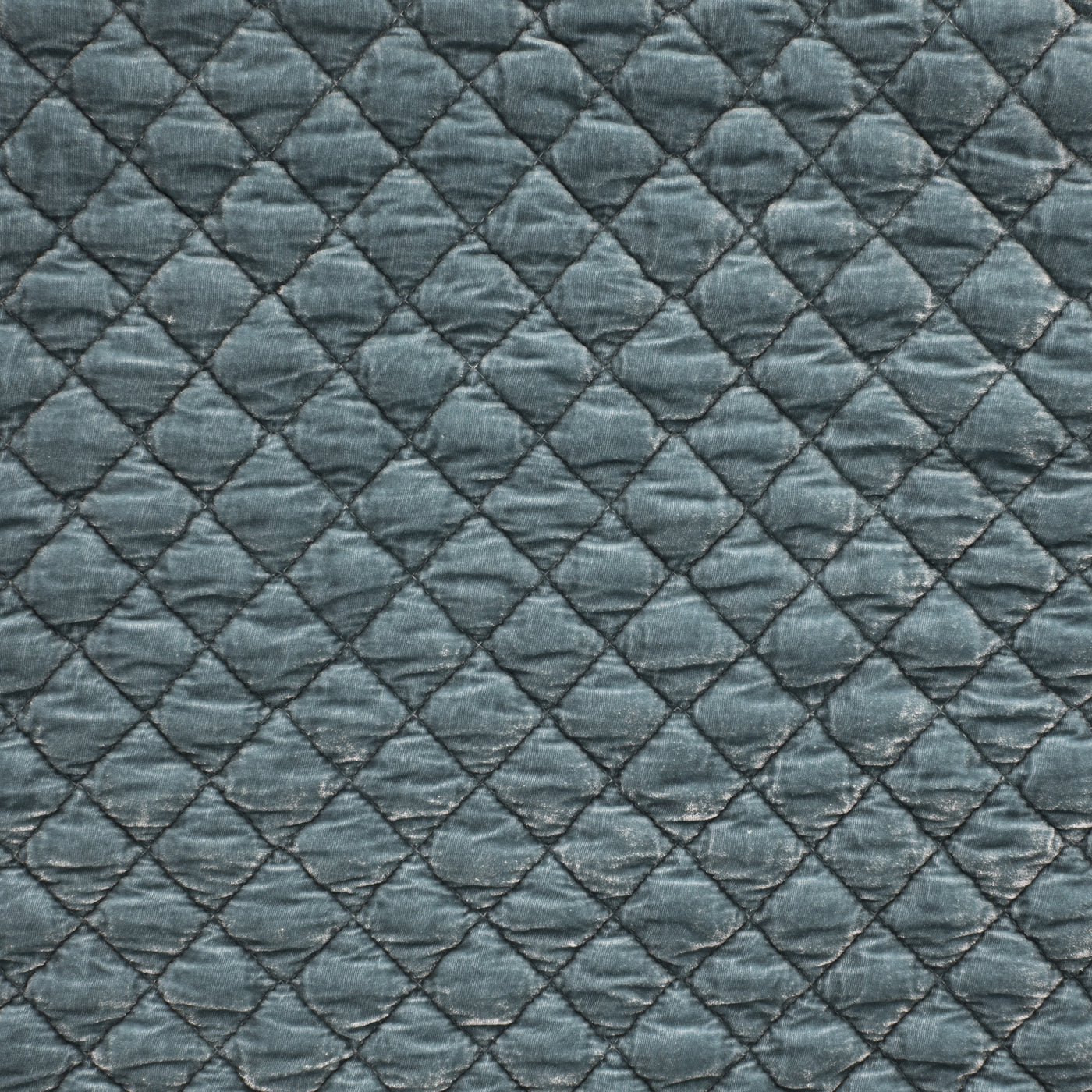 Close-up of Cloud silk velvet quilted diamond pattern on Bella Notte sham.