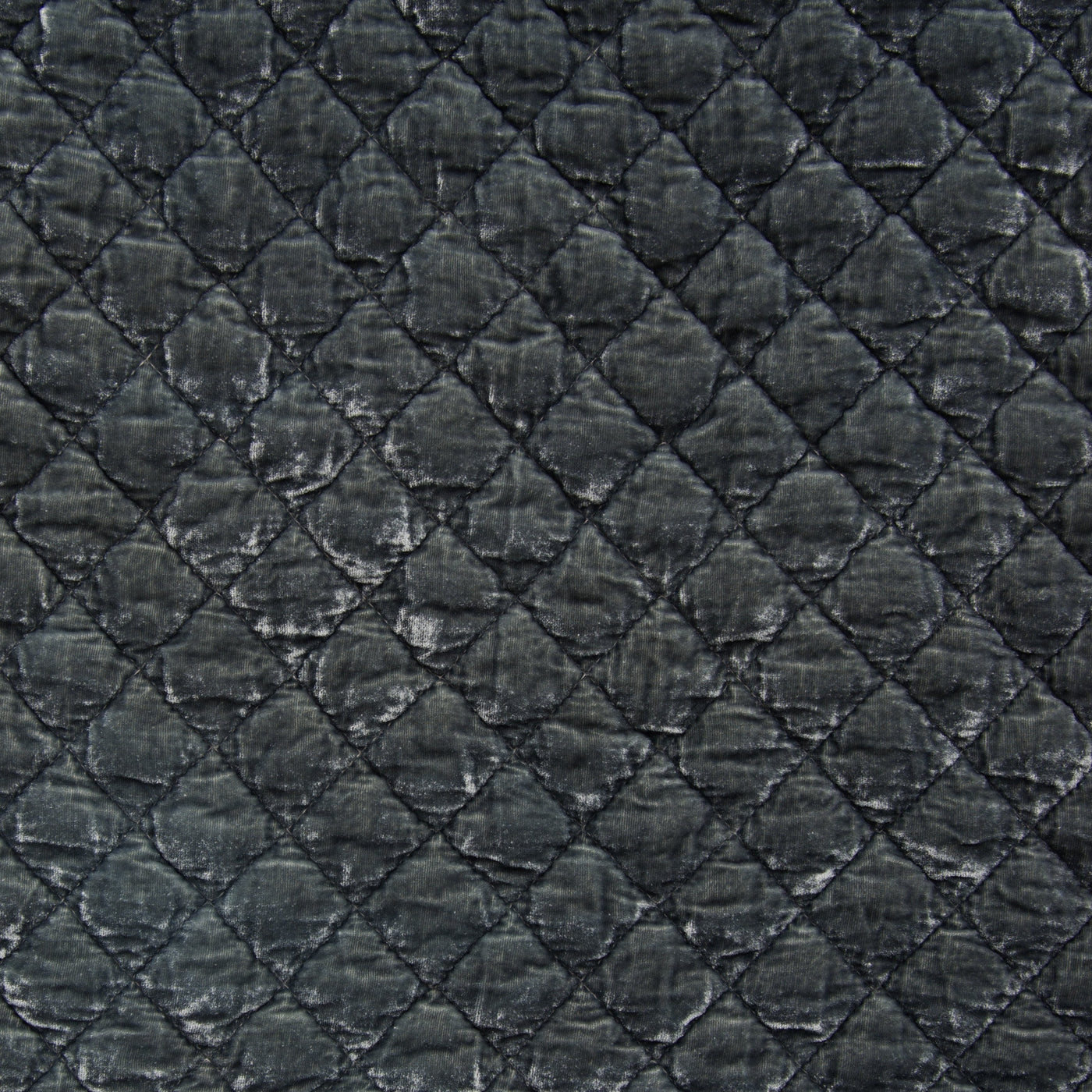 Close-up of Bella Notte Silk Velvet Quilted Throw Pillow in Fog, showing ogee quilting detail.