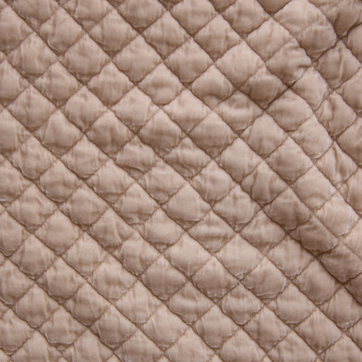 Close-up of Bella Notte Silk Velvet Quilted Sham in Pearl, showing diamond quilt pattern detail.